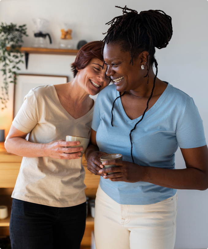 front-view-lesbian-couple-with-coffee-cups (1)